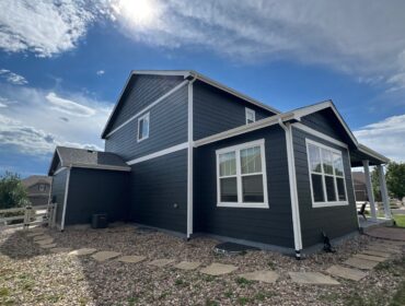 Castle Rock exterior — dark body with crisp white trim