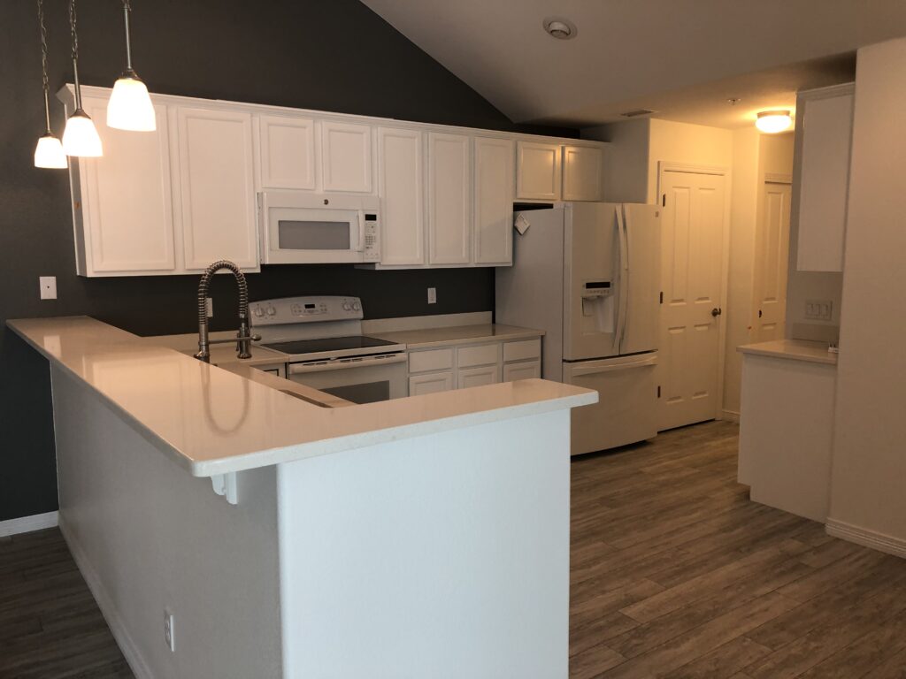 Finished kitchen cabinet refinish after — H3 Painting