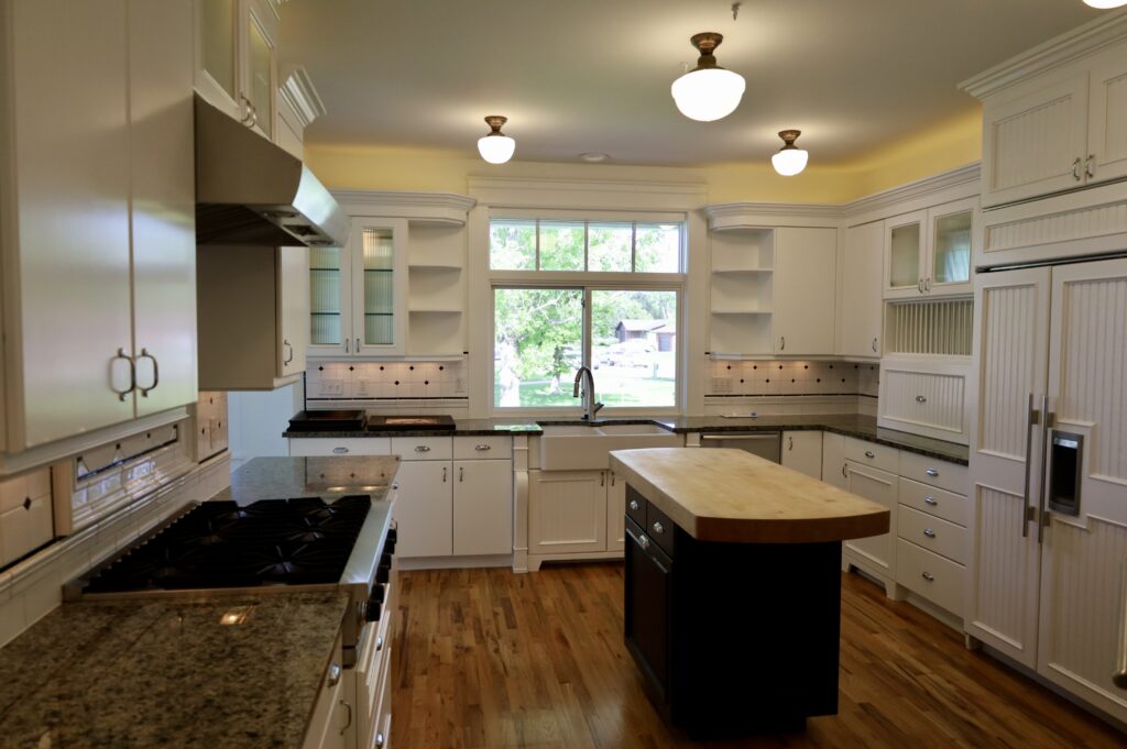Finished kitchen cabinet refinish after — H3 Painting