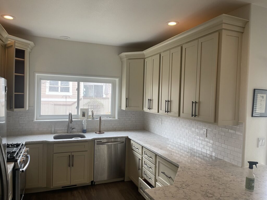 Finished light kitchen cabinet painting after — H3 Painting