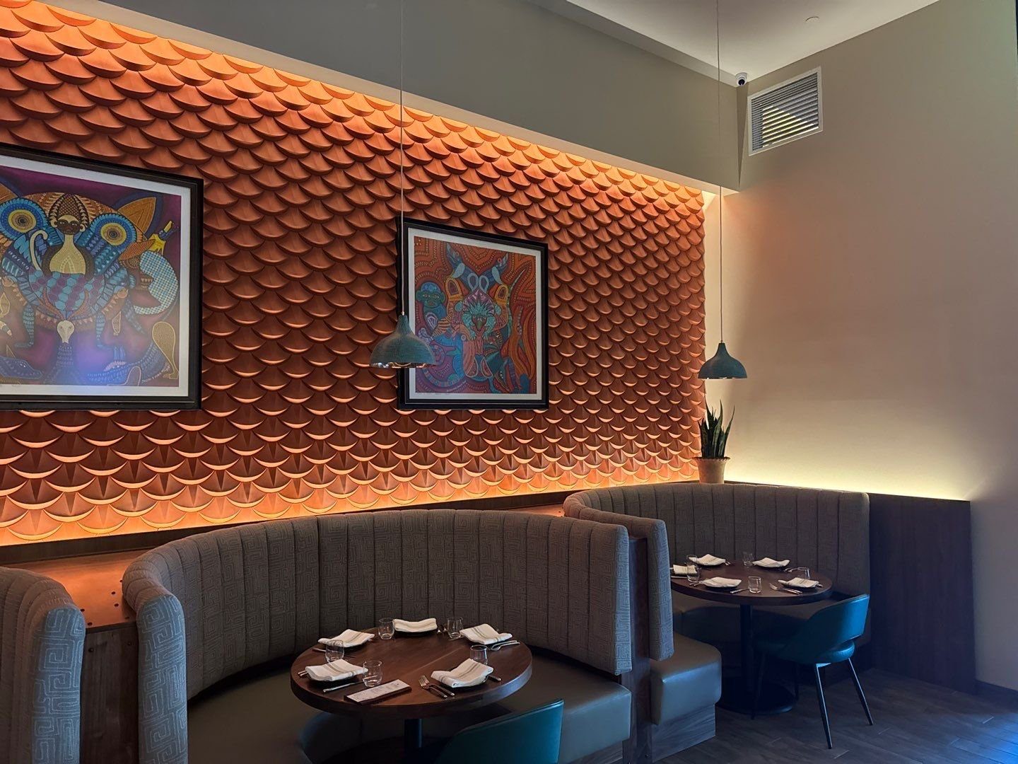 Booth seating area with painted walls at El Tule restaurant