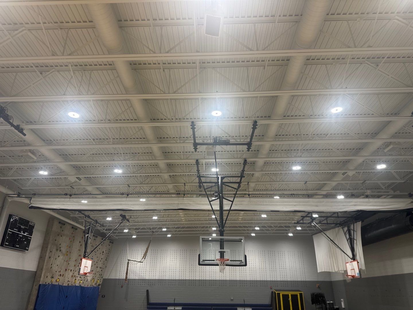 Mesa Middle School gym ceiling and upper walls after commercial painting
