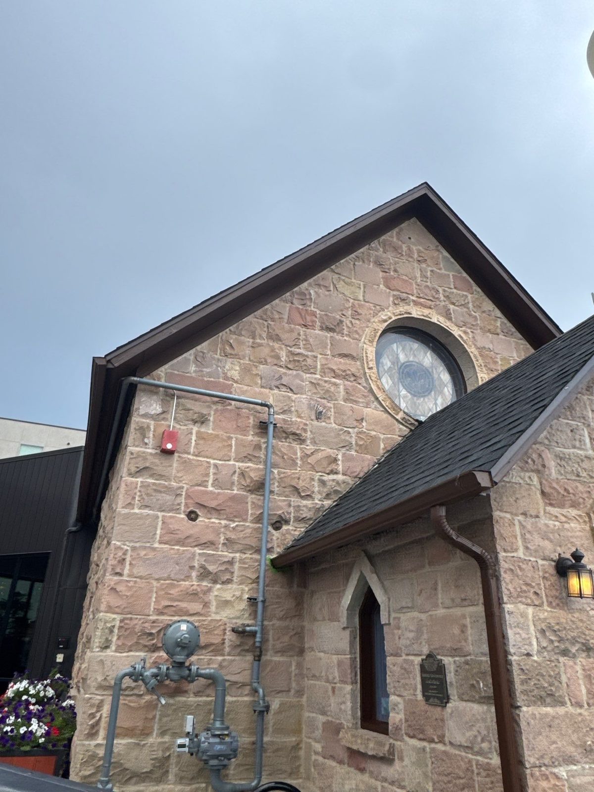 Historic stone church exterior at Scileppi's in Castle Rock with painted trim and exterior details
